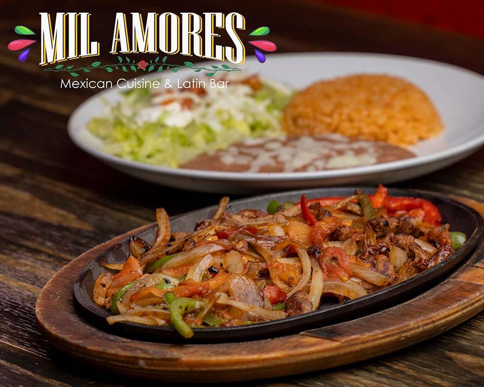 two dishes consisting of beans, rice, salad, and steak with veggies